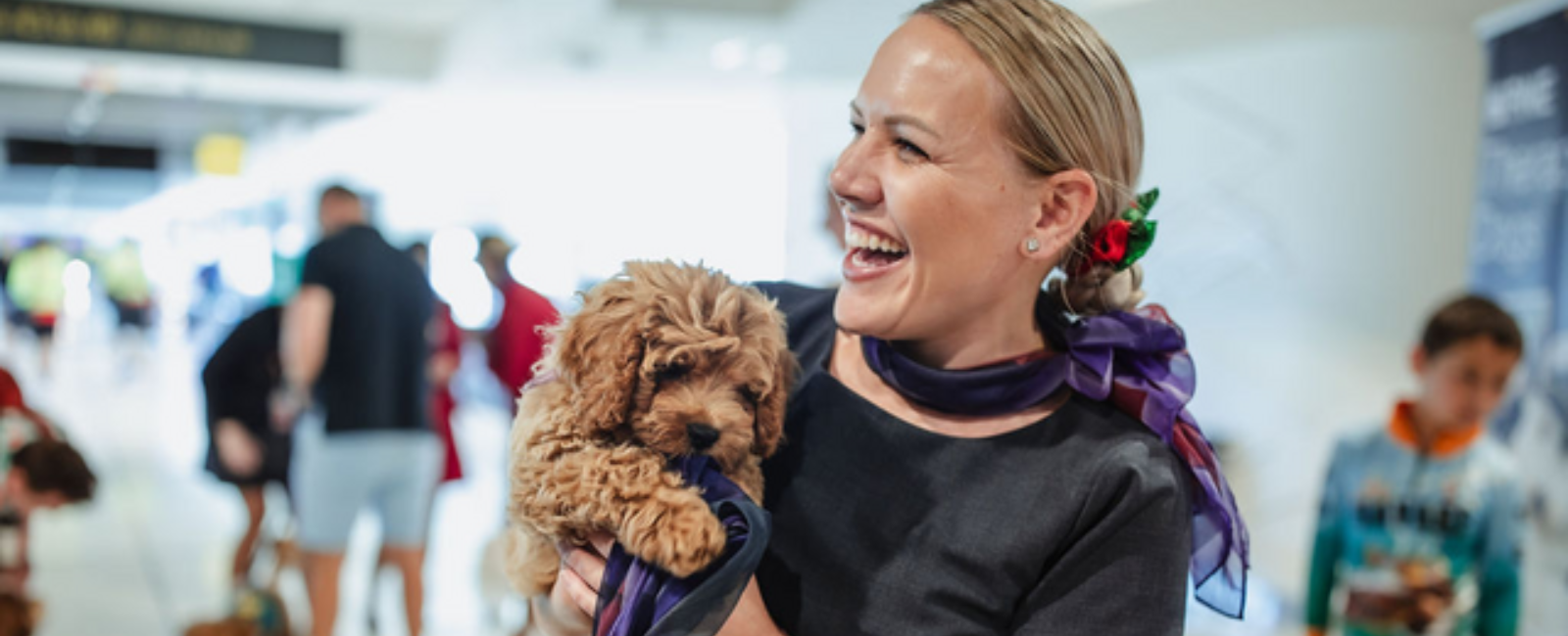 Therapy dog with Brisbane Airport staff Therapy dog with Brisbane Airport staff